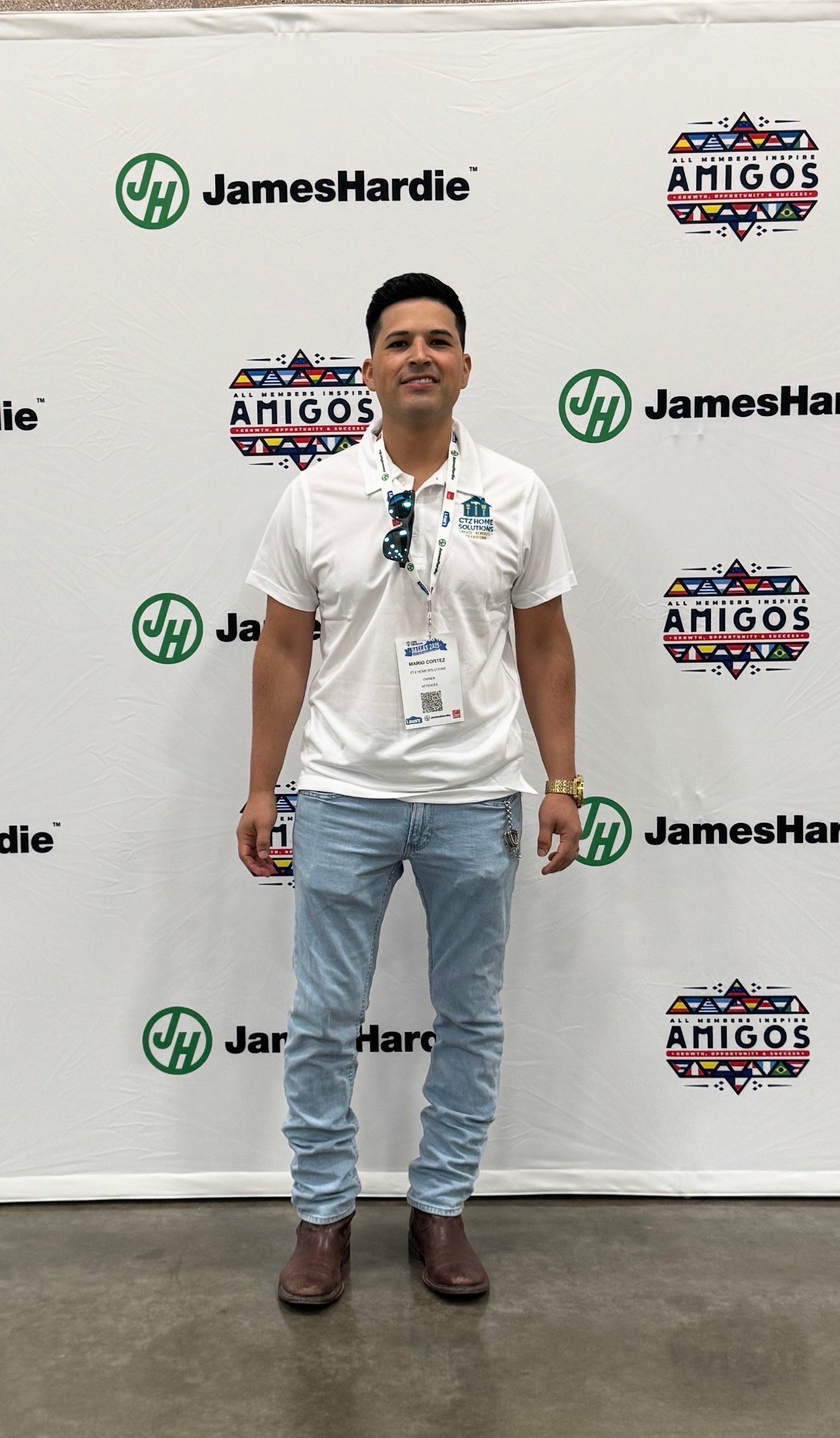 Man in front of backdrop